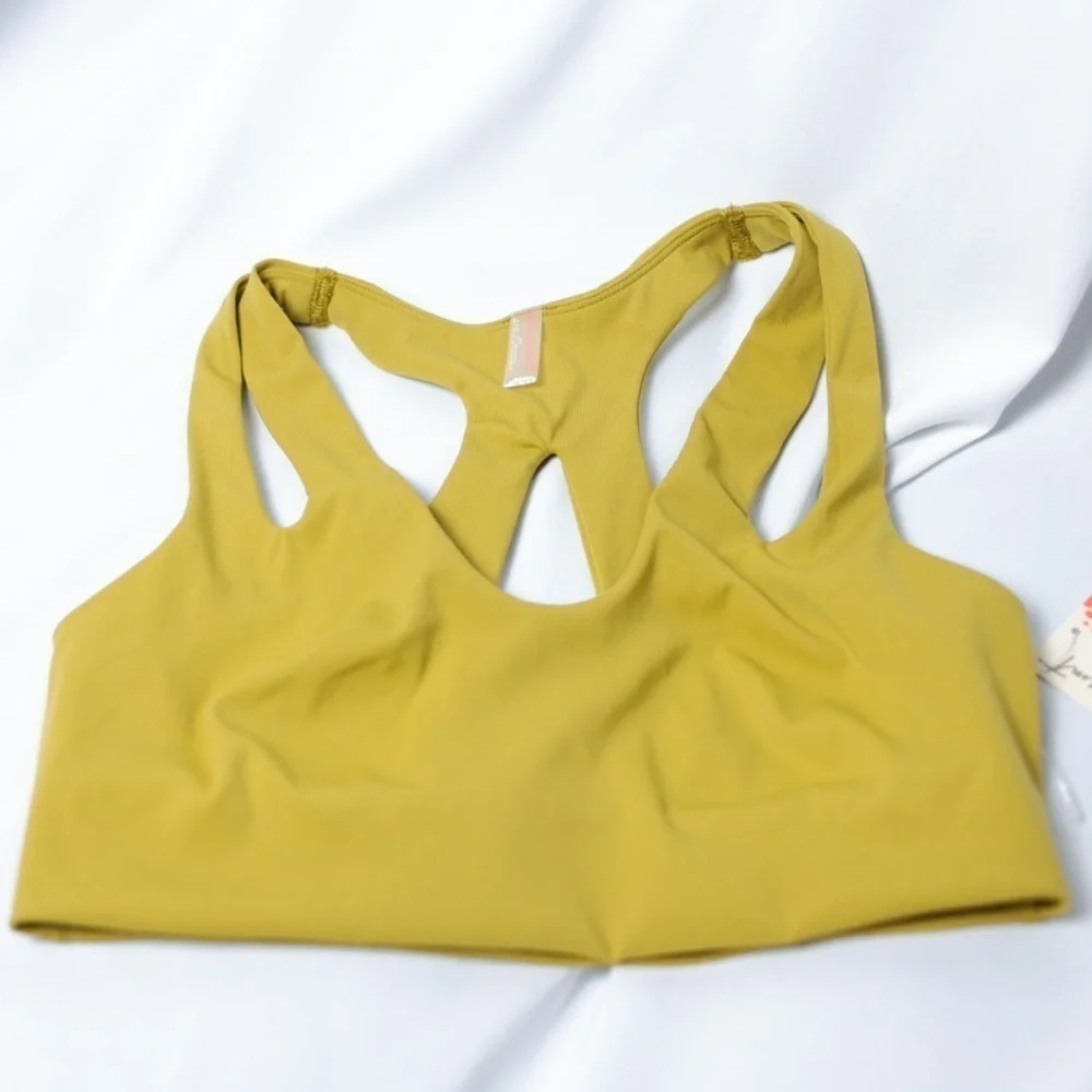 🅽🅴🆆 𝓕𝓻𝓮𝓮 𝓟𝓮𝓸𝓹𝓵𝓮 Movement racerback marigold sports bra, size XS